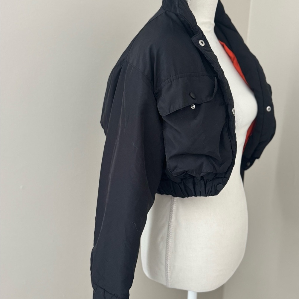 Stylish Black Bomber Jacket with Vibrant Red Interior